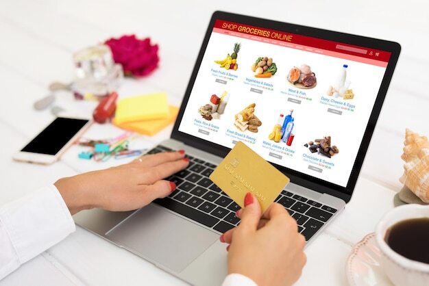 Photo woman shopping for groceries online and paying by credit card